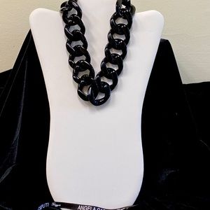 Designer Angela Caputi, black resin 18” link necklace.